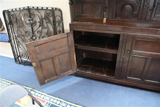 A 17th century oak court cupboard, W.5ft 8in. D.1ft 11in. H.5ft 1in.